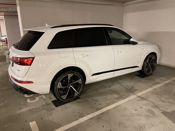 Audi Q7 side-rear view in parking